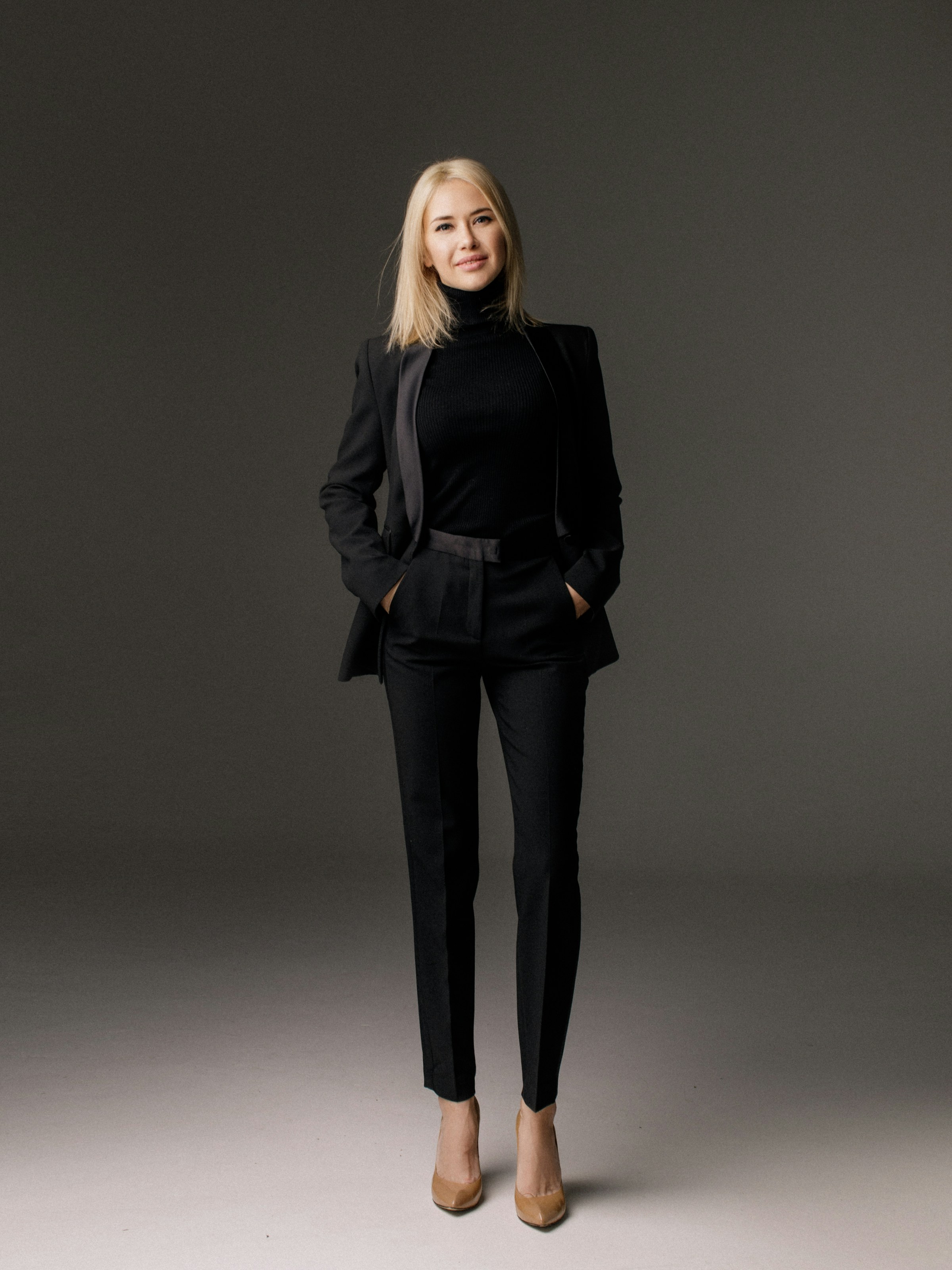 Portrait of a professional in a black suit